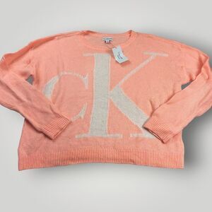 NWT Calvin Klein Women’s M Peach Oversized Sweater CK Logo Front Long Sleeve